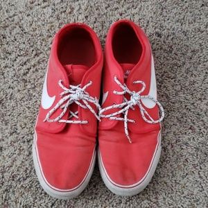 Red/orange Nike shoes